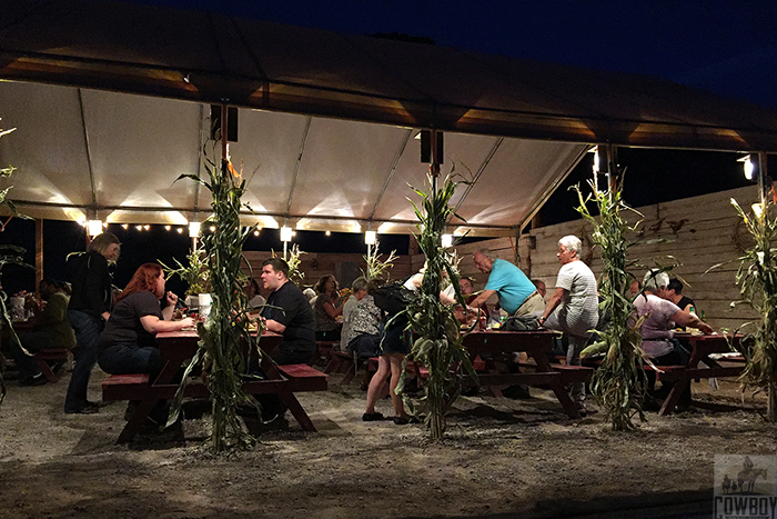 A group of riders enjoy a steak BBQ under the stars after Horseback Riding in Las Vegas at Cowboy Trail Rides in Red Rock Canyon